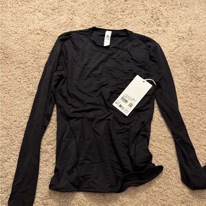 Lululemon Nulu Crewneck Long Sleeve size medium. Brand new, with tags.